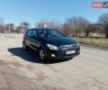 Черный Хендай i30, объемом двигателя 1.6 л и пробегом 224 тыс. км за 5450 $, фото 1 на Automoto.ua