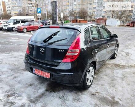 Черный Хендай i30, объемом двигателя 1.4 л и пробегом 240 тыс. км за 6100 $, фото 9 на Automoto.ua