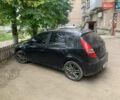 Черный Хендай i30, объемом двигателя 1.6 л и пробегом 223 тыс. км за 6400 $, фото 1 на Automoto.ua