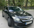 Черный Хендай i30, объемом двигателя 1.58 л и пробегом 285 тыс. км за 6300 $, фото 2 на Automoto.ua