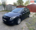 Черный Хендай i30, объемом двигателя 1.58 л и пробегом 294 тыс. км за 6000 $, фото 1 на Automoto.ua