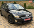 Чорний Хендай i30, об'ємом двигуна 1.4 л та пробігом 170 тис. км за 5950 $, фото 1 на Automoto.ua