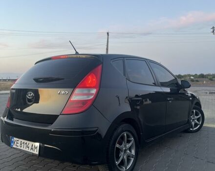 Черный Хендай i30, объемом двигателя 1.4 л и пробегом 275 тыс. км за 3500 $, фото 4 на Automoto.ua