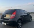 Черный Хендай i30, объемом двигателя 1.4 л и пробегом 275 тыс. км за 3500 $, фото 4 на Automoto.ua
