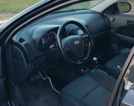 Черный Хендай i30, объемом двигателя 1.6 л и пробегом 164 тыс. км за 7300 $, фото 4 на Automoto.ua