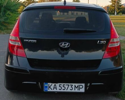 Черный Хендай i30, объемом двигателя 1.6 л и пробегом 164 тыс. км за 7300 $, фото 1 на Automoto.ua