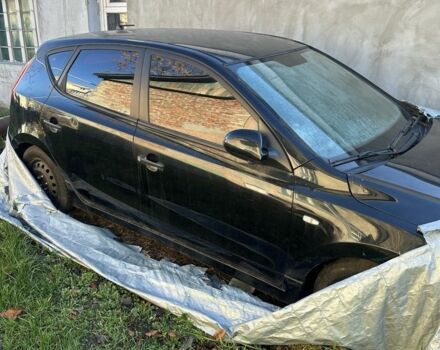 Черный Хендай i30, объемом двигателя 1.4 л и пробегом 100 тыс. км за 3600 $, фото 1 на Automoto.ua