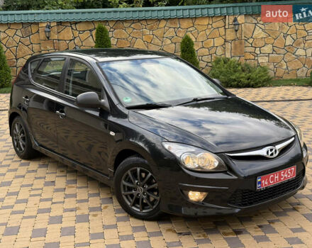 Чорний Хендай i30, об'ємом двигуна 1.4 л та пробігом 170 тис. км за 5950 $, фото 2 на Automoto.ua