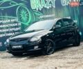 Черный Хендай i30, объемом двигателя 1.4 л и пробегом 231 тыс. км за 5400 $, фото 1 на Automoto.ua