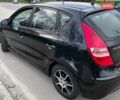Черный Хендай i30, объемом двигателя 1.4 л и пробегом 223 тыс. км за 5600 $, фото 1 на Automoto.ua