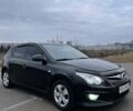 Черный Хендай i30, объемом двигателя 1.4 л и пробегом 172 тыс. км за 6950 $, фото 5 на Automoto.ua