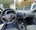 Черный Хендай i30, объемом двигателя 1.4 л и пробегом 175 тыс. км за 5700 $, фото 4 на Automoto.ua