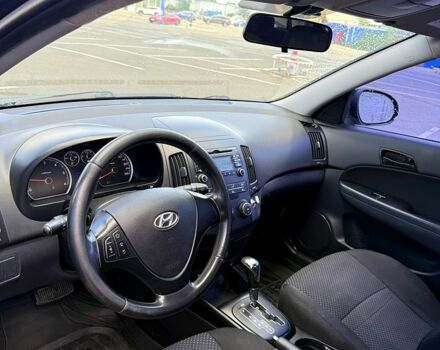 Чорний Хендай i30, об'ємом двигуна 1.6 л та пробігом 230 тис. км за 6500 $, фото 4 на Automoto.ua
