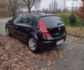 Черный Хендай i30, объемом двигателя 1.6 л и пробегом 198 тыс. км за 7100 $, фото 1 на Automoto.ua