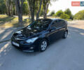 Черный Хендай i30, объемом двигателя 1.4 л и пробегом 230 тыс. км за 6200 $, фото 1 на Automoto.ua