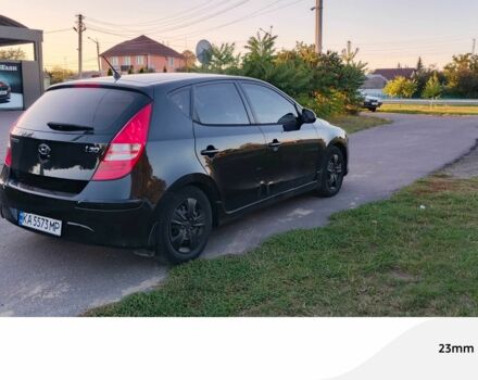Черный Хендай i30, объемом двигателя 1.6 л и пробегом 164 тыс. км за 7300 $, фото 2 на Automoto.ua