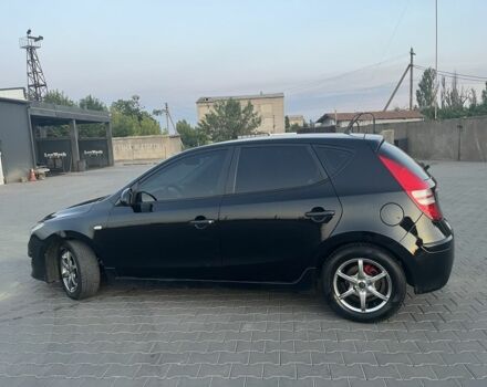 Черный Хендай i30, объемом двигателя 1.4 л и пробегом 275 тыс. км за 3500 $, фото 2 на Automoto.ua