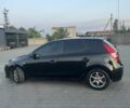 Черный Хендай i30, объемом двигателя 1.4 л и пробегом 275 тыс. км за 3500 $, фото 2 на Automoto.ua