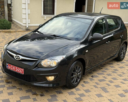 Чорний Хендай i30, об'ємом двигуна 1.4 л та пробігом 170 тис. км за 5950 $, фото 1 на Automoto.ua