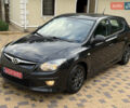Чорний Хендай i30, об'ємом двигуна 1.4 л та пробігом 170 тис. км за 5950 $, фото 1 на Automoto.ua