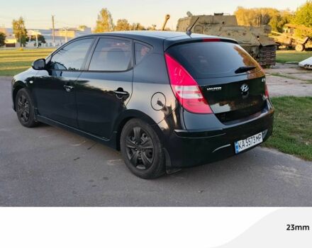 Черный Хендай i30, объемом двигателя 1.6 л и пробегом 164 тыс. км за 7300 $, фото 3 на Automoto.ua