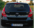 Черный Хендай i30, объемом двигателя 1.59 л и пробегом 180 тыс. км за 7000 $, фото 1 на Automoto.ua