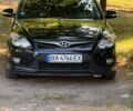 Черный Хендай i30, объемом двигателя 1.58 л и пробегом 200 тыс. км за 7300 $, фото 2 на Automoto.ua