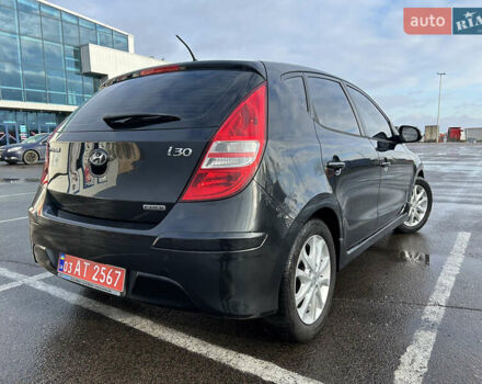 Черный Хендай i30, объемом двигателя 1.6 л и пробегом 145 тыс. км за 7200 $, фото 8 на Automoto.ua