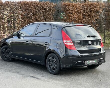 Черный Хендай i30, объемом двигателя 1.6 л и пробегом 160 тыс. км за 6500 $, фото 3 на Automoto.ua