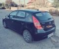 Черный Хендай i30, объемом двигателя 1.4 л и пробегом 210 тыс. км за 5600 $, фото 3 на Automoto.ua