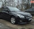 Черный Хендай i30, объемом двигателя 1.58 л и пробегом 125 тыс. км за 7200 $, фото 1 на Automoto.ua