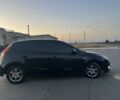 Черный Хендай i30, объемом двигателя 1.4 л и пробегом 275 тыс. км за 3500 $, фото 5 на Automoto.ua