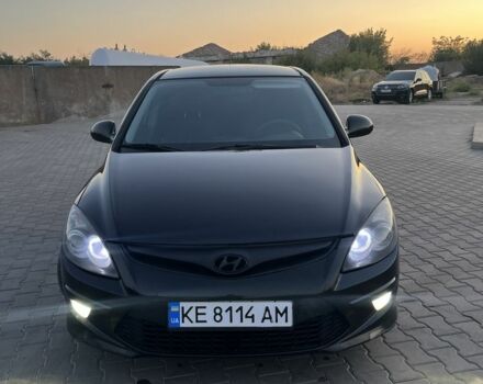 Черный Хендай i30, объемом двигателя 1.4 л и пробегом 275 тыс. км за 3500 $, фото 7 на Automoto.ua