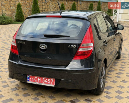Чорний Хендай i30, об'ємом двигуна 1.4 л та пробігом 170 тис. км за 5950 $, фото 18 на Automoto.ua