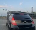 Черный Хендай i30, объемом двигателя 1.4 л и пробегом 275 тыс. км за 3500 $, фото 3 на Automoto.ua