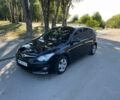 Черный Хендай i30, объемом двигателя 1.4 л и пробегом 230 тыс. км за 6200 $, фото 1 на Automoto.ua