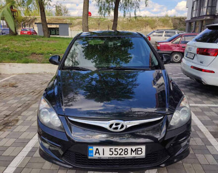 Черный Хендай i30, объемом двигателя 1.4 л и пробегом 126 тыс. км за 5200 $, фото 4 на Automoto.ua