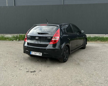 Чорний Хендай i30, об'ємом двигуна 1.6 л та пробігом 253 тис. км за 6800 $, фото 2 на Automoto.ua