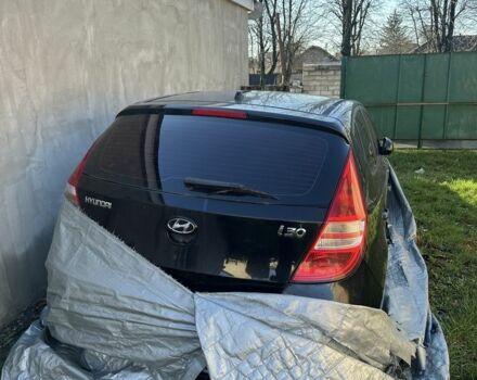 Черный Хендай i30, объемом двигателя 1.4 л и пробегом 100 тыс. км за 3600 $, фото 2 на Automoto.ua