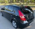 Черный Хендай i30, объемом двигателя 1.4 л и пробегом 230 тыс. км за 6100 $, фото 1 на Automoto.ua