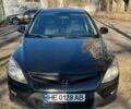 Черный Хендай i30, объемом двигателя 1.4 л и пробегом 260 тыс. км за 4100 $, фото 1 на Automoto.ua