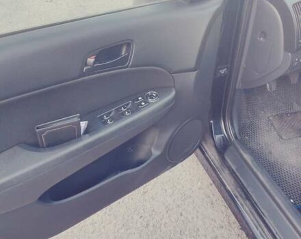 Черный Хендай i30, объемом двигателя 1.4 л и пробегом 210 тыс. км за 5600 $, фото 2 на Automoto.ua