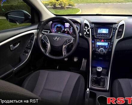 Чорний Хендай i30, об'ємом двигуна 1.6 л та пробігом 160 тис. км за 8699 $, фото 8 на Automoto.ua