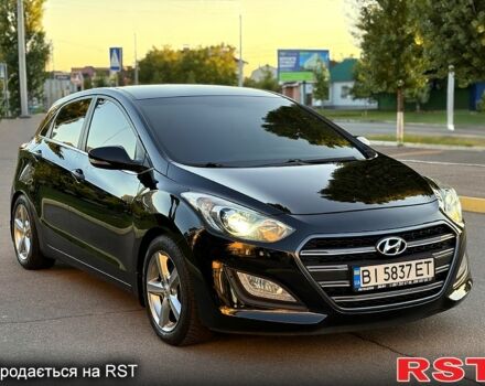 Чорний Хендай i30, об'ємом двигуна 1.6 л та пробігом 160 тис. км за 8699 $, фото 2 на Automoto.ua