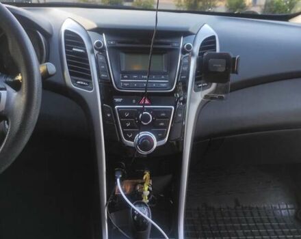 Чорний Хендай i30, об'ємом двигуна 1.6 л та пробігом 100 тис. км за 9900 $, фото 2 на Automoto.ua