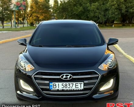 Чорний Хендай i30, об'ємом двигуна 1.6 л та пробігом 160 тис. км за 8699 $, фото 3 на Automoto.ua