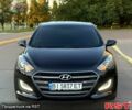 Чорний Хендай i30, об'ємом двигуна 1.6 л та пробігом 160 тис. км за 8699 $, фото 3 на Automoto.ua