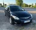 Черный Хендай i30, объемом двигателя 1.58 л и пробегом 212 тыс. км за 6900 $, фото 1 на Automoto.ua