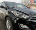 Черный Хендай i30, объемом двигателя 1.58 л и пробегом 87 тыс. км за 11700 $, фото 1 на Automoto.ua