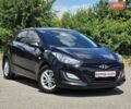 Чорний Хендай i30, об'ємом двигуна 1.4 л та пробігом 155 тис. км за 7899 $, фото 1 на Automoto.ua
